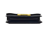 a black purse with a gold clasp on the front