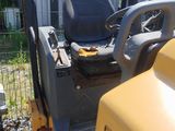 an image of a tractor with a seat on it ' s back