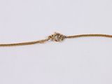 a gold chain with a clasp on a white background