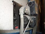 a picture of a water heater with a hose attached to it