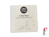 french children ' s book, le petit prince, with a picture of a man and a dog