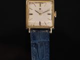 an image of a wrist watch with a blue strap
