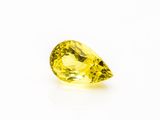 a yellow diamond on a white background