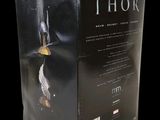 a close up of a box with a sword on top of it