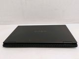 an open laptop computer sitting on top of a white table