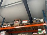 a large amount of boxes on the shelves in the warehouse