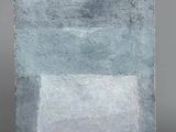 an image of a blue and white painting on a gray surface
