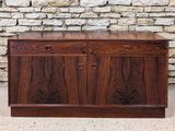 an image of a wooden chest with drawers on it
