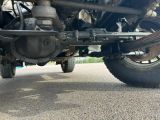 a motorcycle that is parked on the side of the road