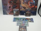 the contents of a game set including cards, tokens and cards