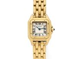 a lady ' s cartier watch with a gold bracelet and roman numerals