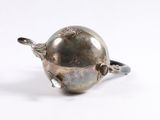 an image of a silver object on a white surface
