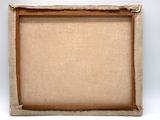 an old picture frame with a piece of cardboard in it