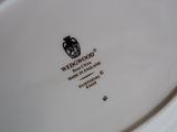 a white plate with a black and white design on it