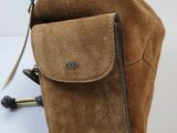an image of a small brown bag with a handle on it