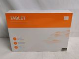 an orange and white box of a tablet on a white surface