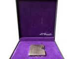 an image of a purple box with a lighter inside of it