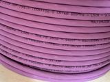 a stack of purple hoses stacked on top of each other