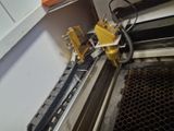 a picture of a machine that is working on a piece of metal