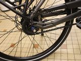 a close up view of a bicycle ' s front wheel