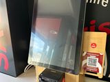 a picture of a computer monitor on a table in a store
