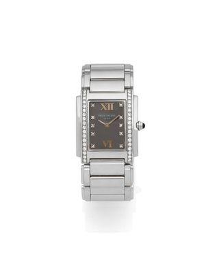 a lady ' s wrist watch with diamonds and a black dial