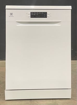 an image of a white dishwasher sitting on the floor
