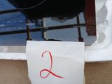 a piece of paper taped to the side of a stove