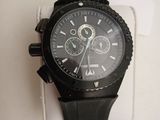 the watch is black and has a black face