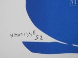 a drawing of a blue whale on a white wall