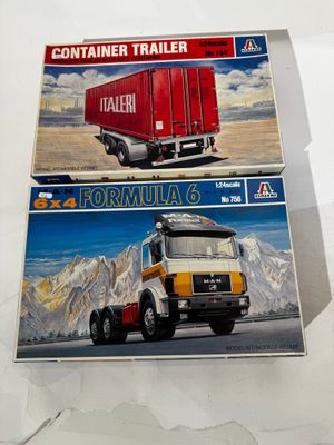 two boxes with a picture of a truck on them