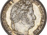 pièce de monnaie en argent portant l'image d'une tête d'homme