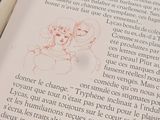 a book with a drawing of a man and a woman on it