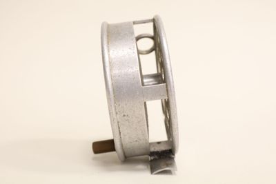 an image of a metal object on a white surface