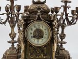 a clock that is sitting on top of a table