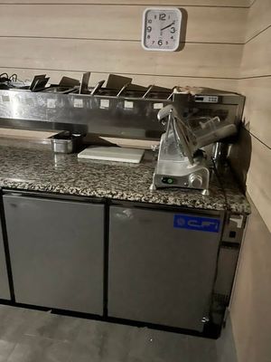 a counter with a bunch of items on it