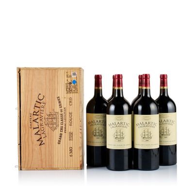 three bottles of wine in front of a wooden box