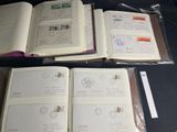 a lot of books that are sitting on a table