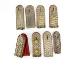 six pairs of military collars with gold and red ribbons