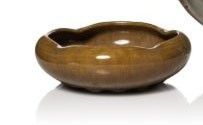 a small bowl and a smaller bowl sitting next to each other