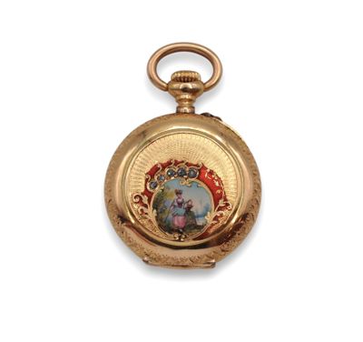 an image of a gold pocket watch with a picture of a woman on it