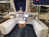 a machine that has a glass of beer on it
