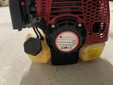 an image of a gas powered engine on the floor