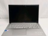 an open laptop computer sitting on top of a white table