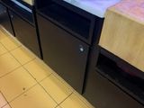 a microwave sitting on top of a counter in a kitchen