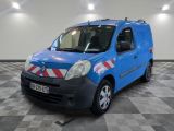 a small blue van that is parked in a room
