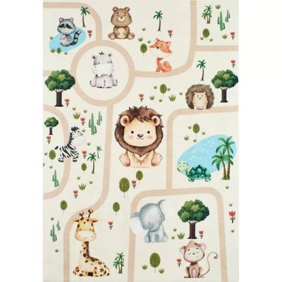 a white area rug with animals and trees on it