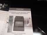 a brochure on a table with a picture of an oven
