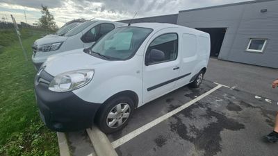a white van that is parked in a parking lot