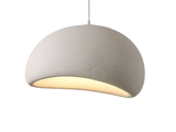 a white light that is hanging from a ceiling